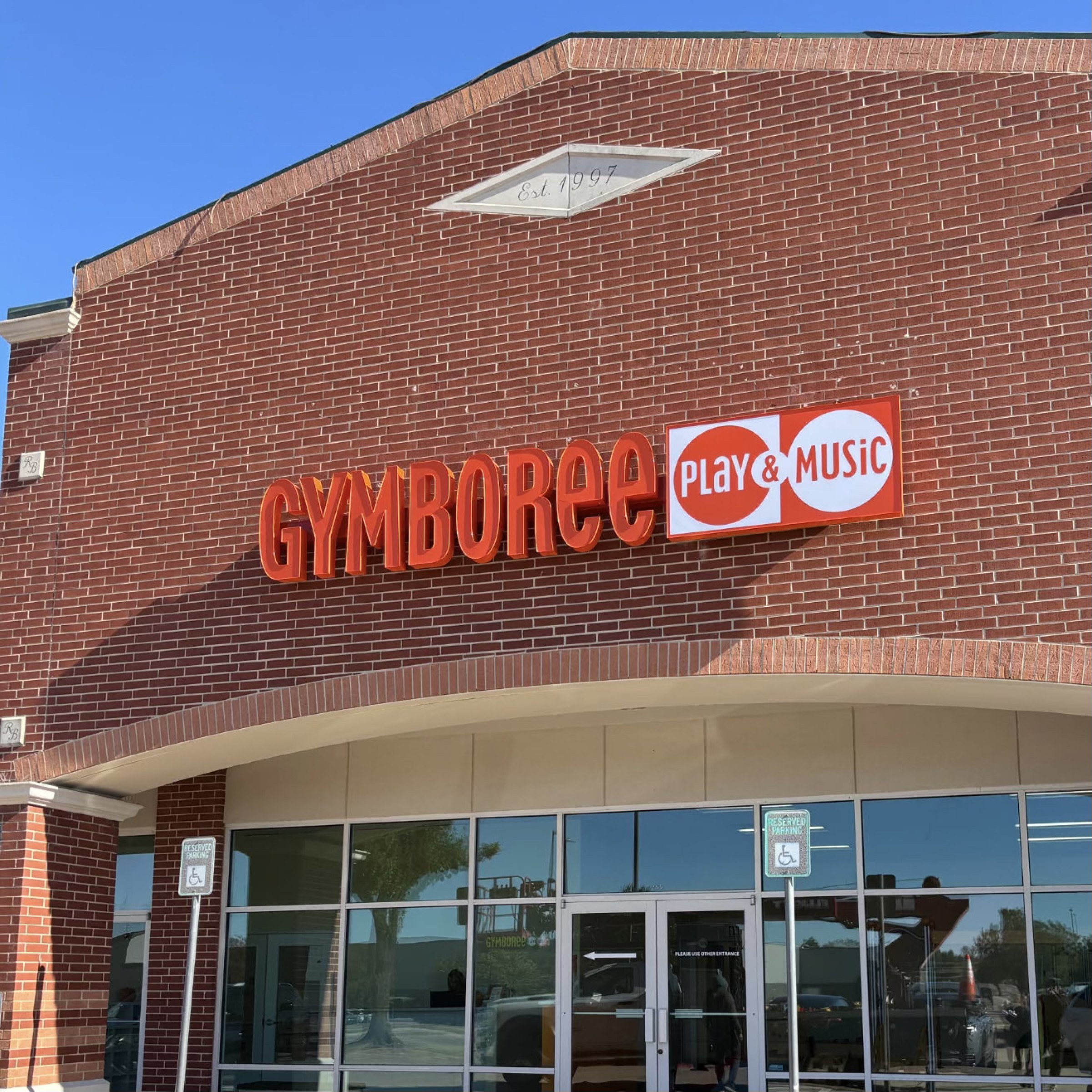 Illuminated channel letters on the Gymboree storefront