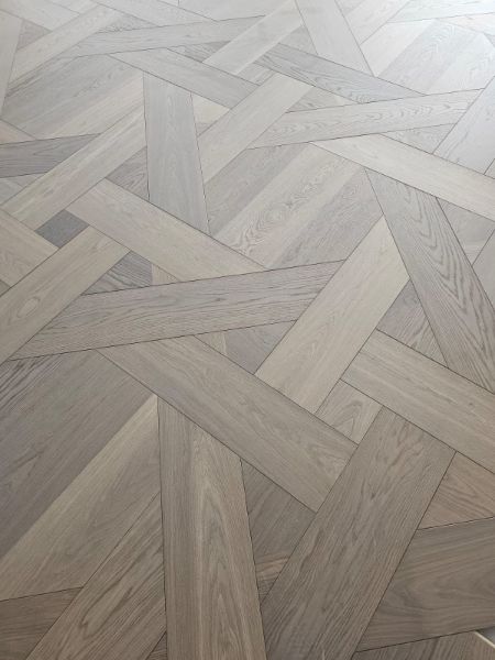Produit Pose de parquet en chevron. 