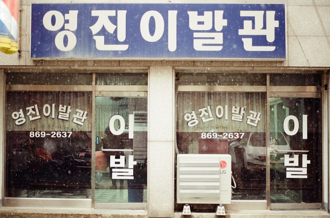 A modern SEO agency workspace with financial charts and a laptop showing analytics, representing stability and client loss protection planning.