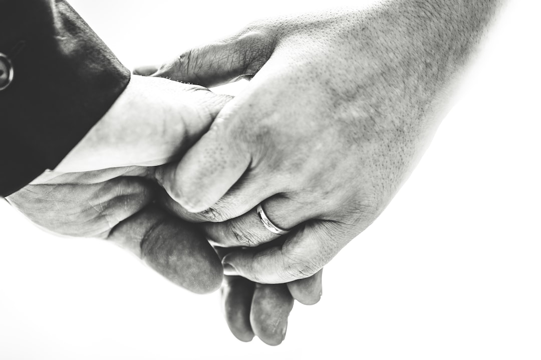 A modern branding agency workspace showing a laptop screen with automated invoice software and financial dashboard, highlighting efficient billing systems.