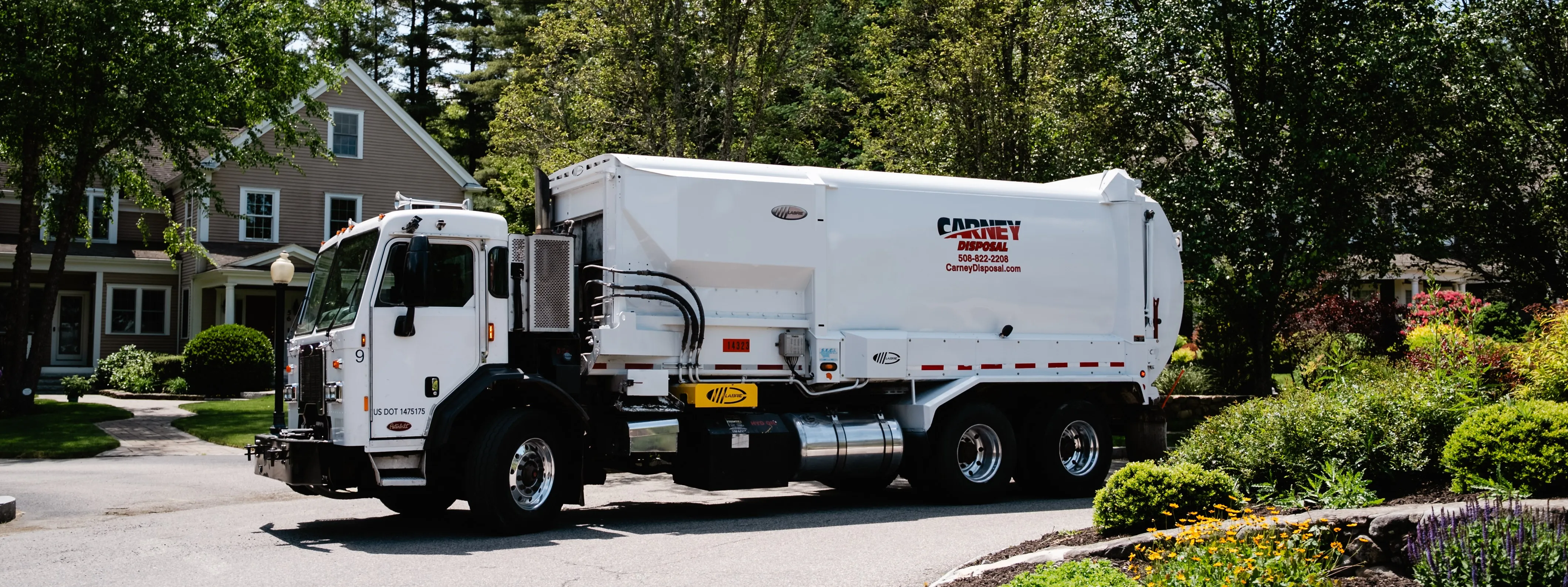 Carney Disposal crew collecting residential trash