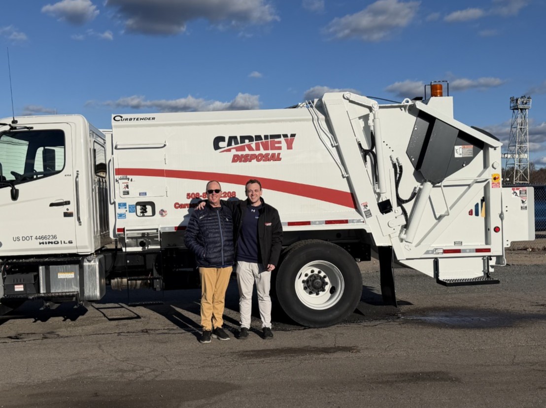 Photo of red, thirty yard dumpster