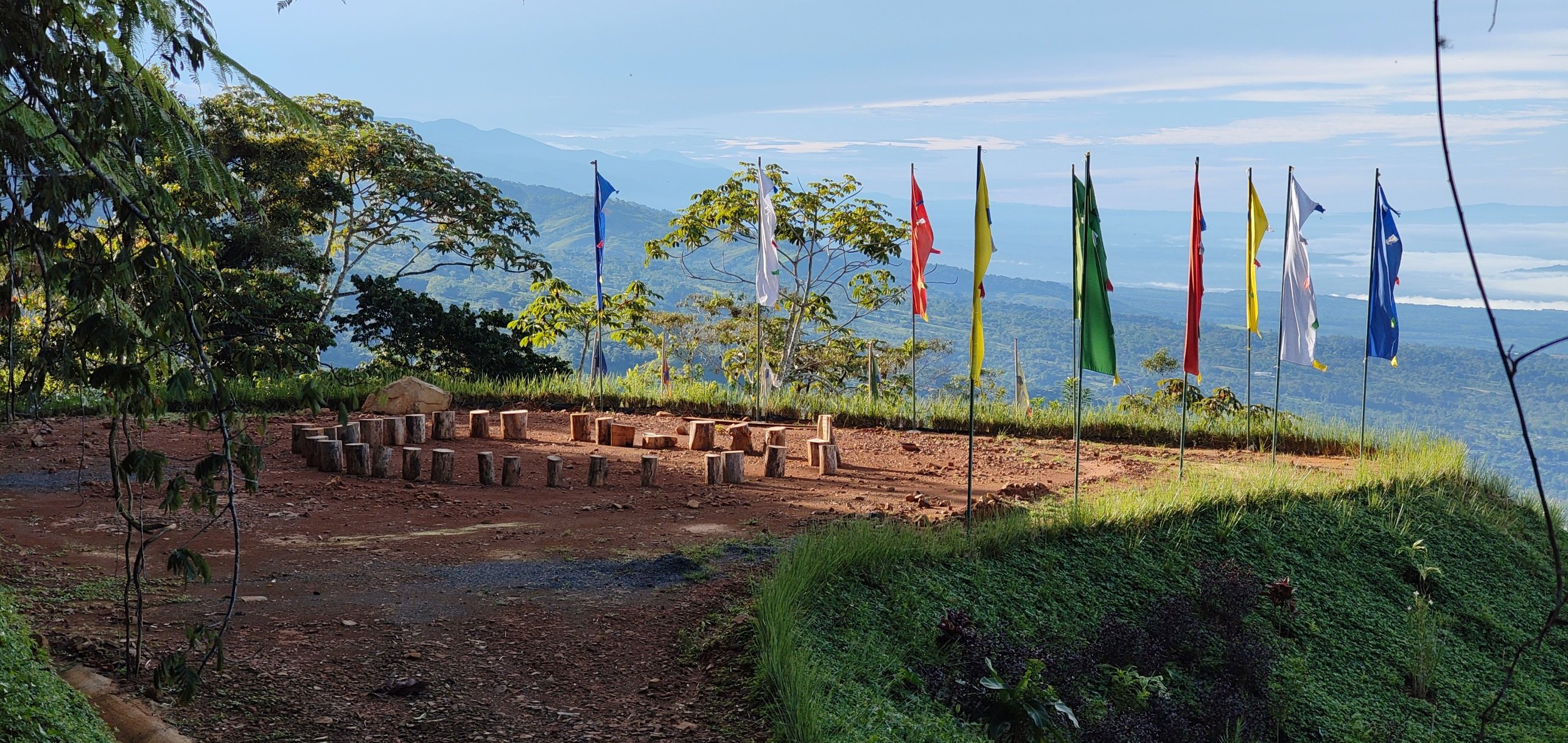 Prayer flags in the early morning on the land at Dewachen, overlooking the valleys of Costa Rica