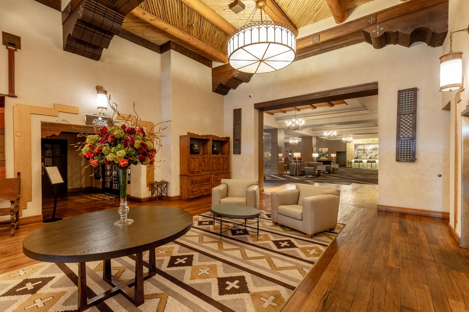 Lobby of Eldorado with wood floor southwest style rug and furniture