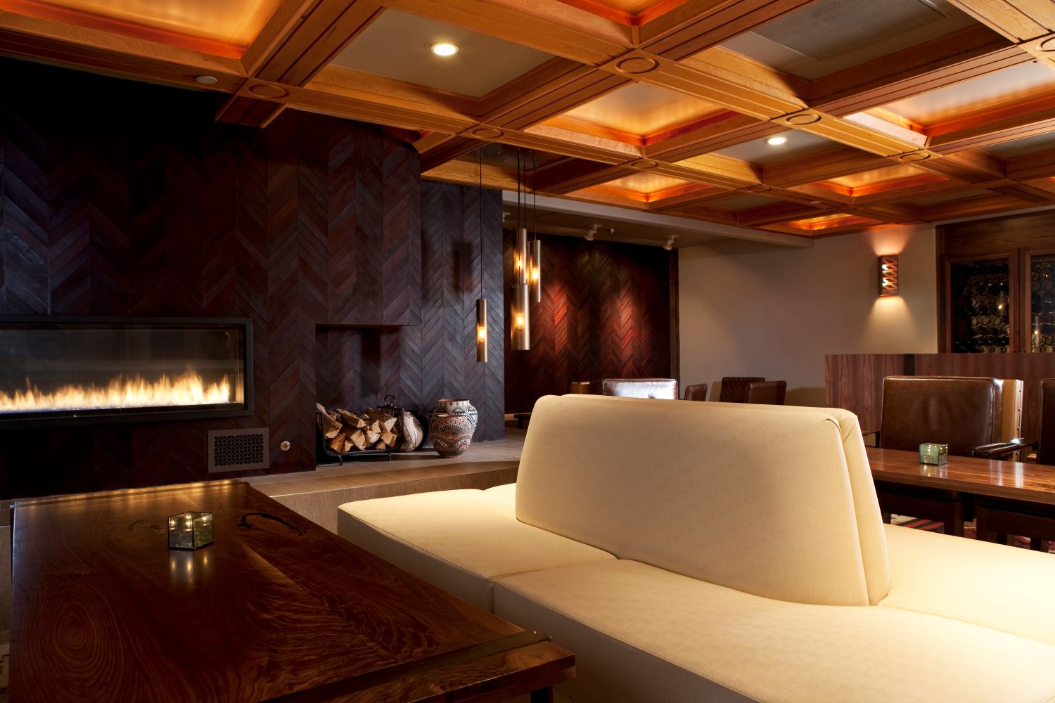 Agave Lounge seating area with fireplace in wall