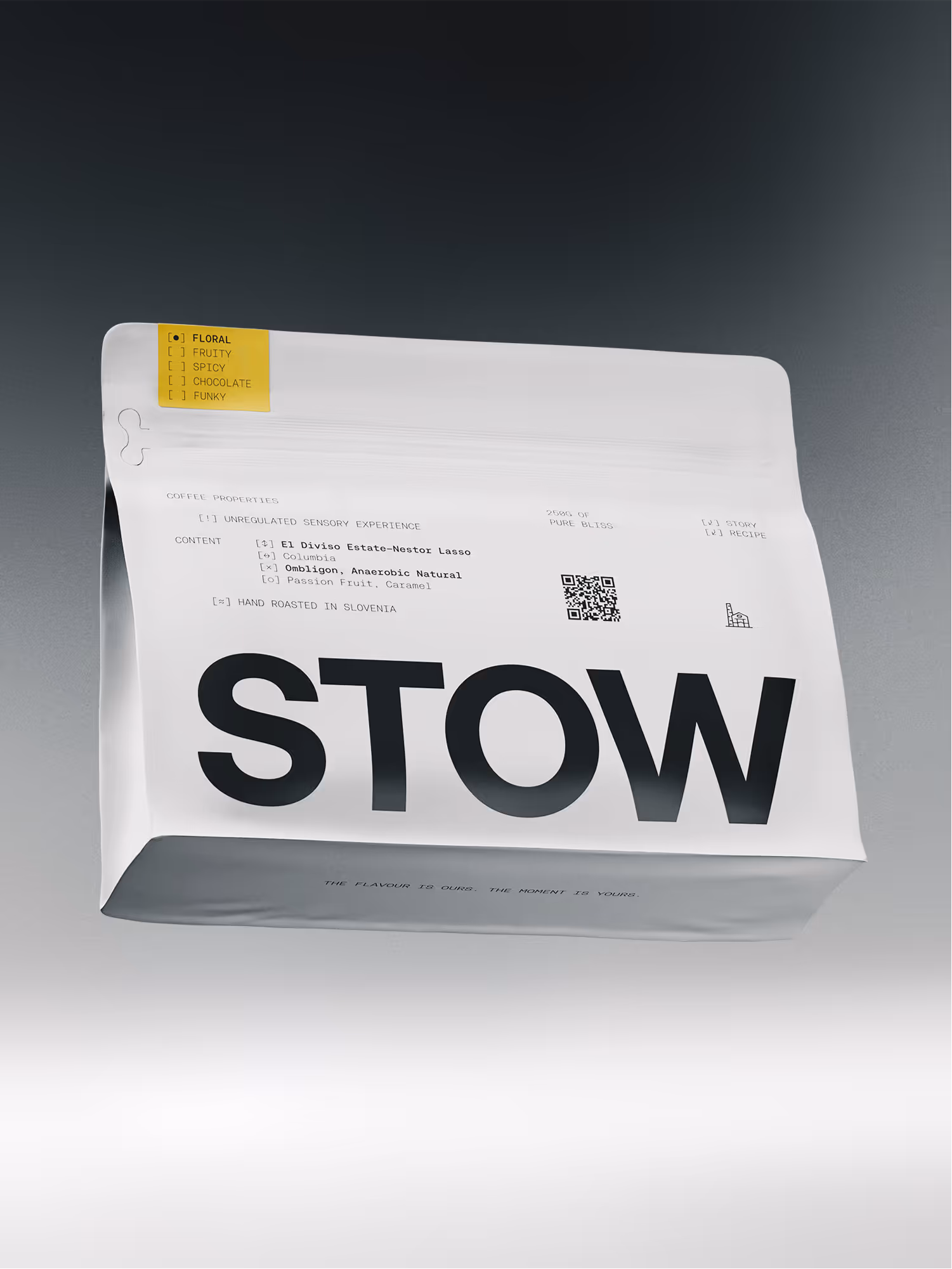 White coffee bag with large black text 'STOW' and coffee properties including floral flavor, hand roasted in Slovenia, and a QR code.