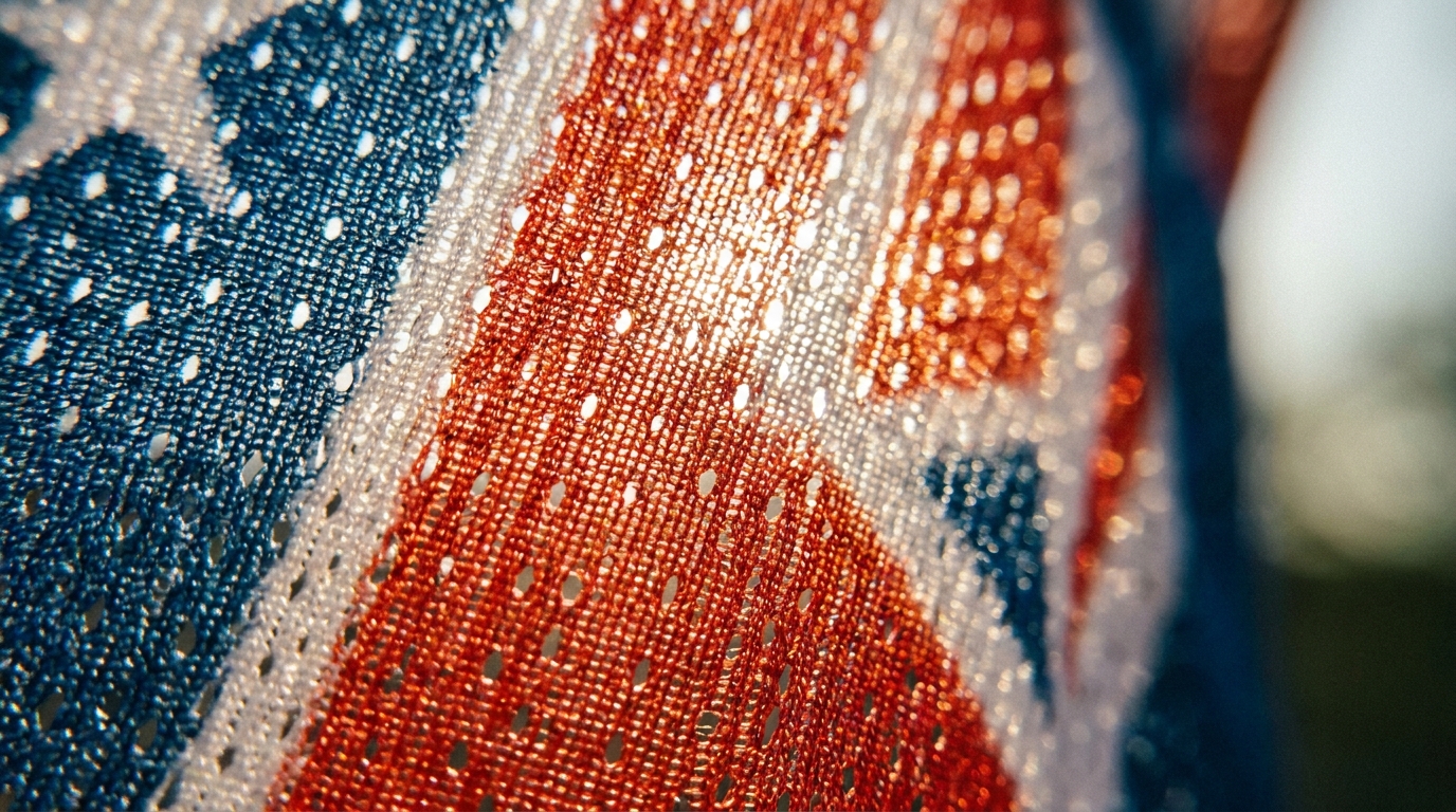 6a6dfeb55ca8bb74e1e64b5b_maille-drapeau-transparent-2025.png