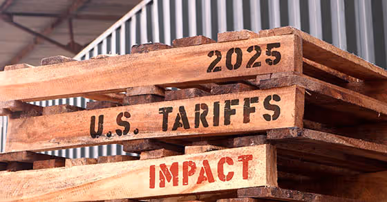 image of wooden pallets with 2025 U.S. tariffs impact - nh business tax preparation services and cpa concept