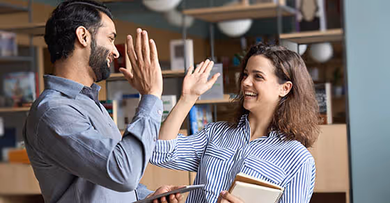 couple high fiving - certified public accountants in seacoast new hampshire