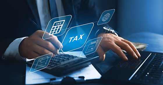 Business professionals reviewing updated payroll tax reporting rules and compliance forms under the One Big Beautiful Bill Act in an office setting