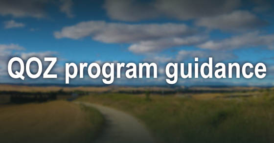 words QOZ Program Guidance imposed on a big sky background