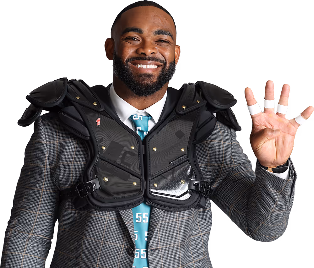 Brandon Graham holding 4 fingers up