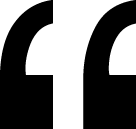 Black and white stylized quotation mark icon.