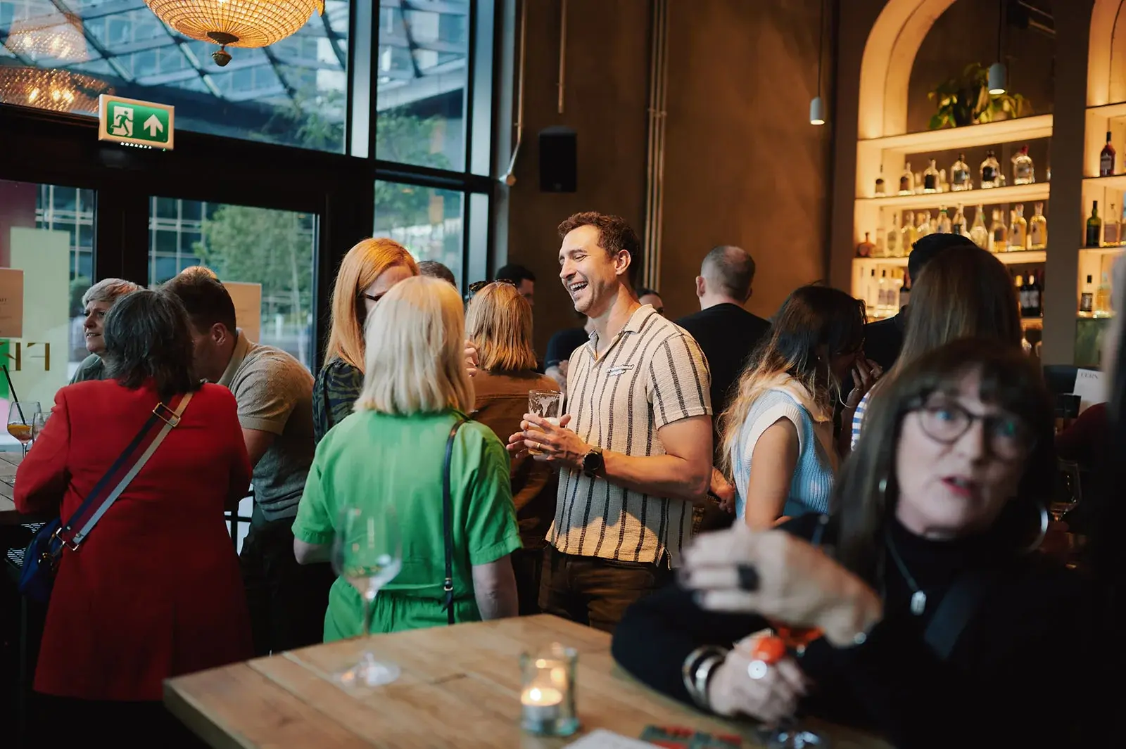 A group of people enjoying an event at Fern