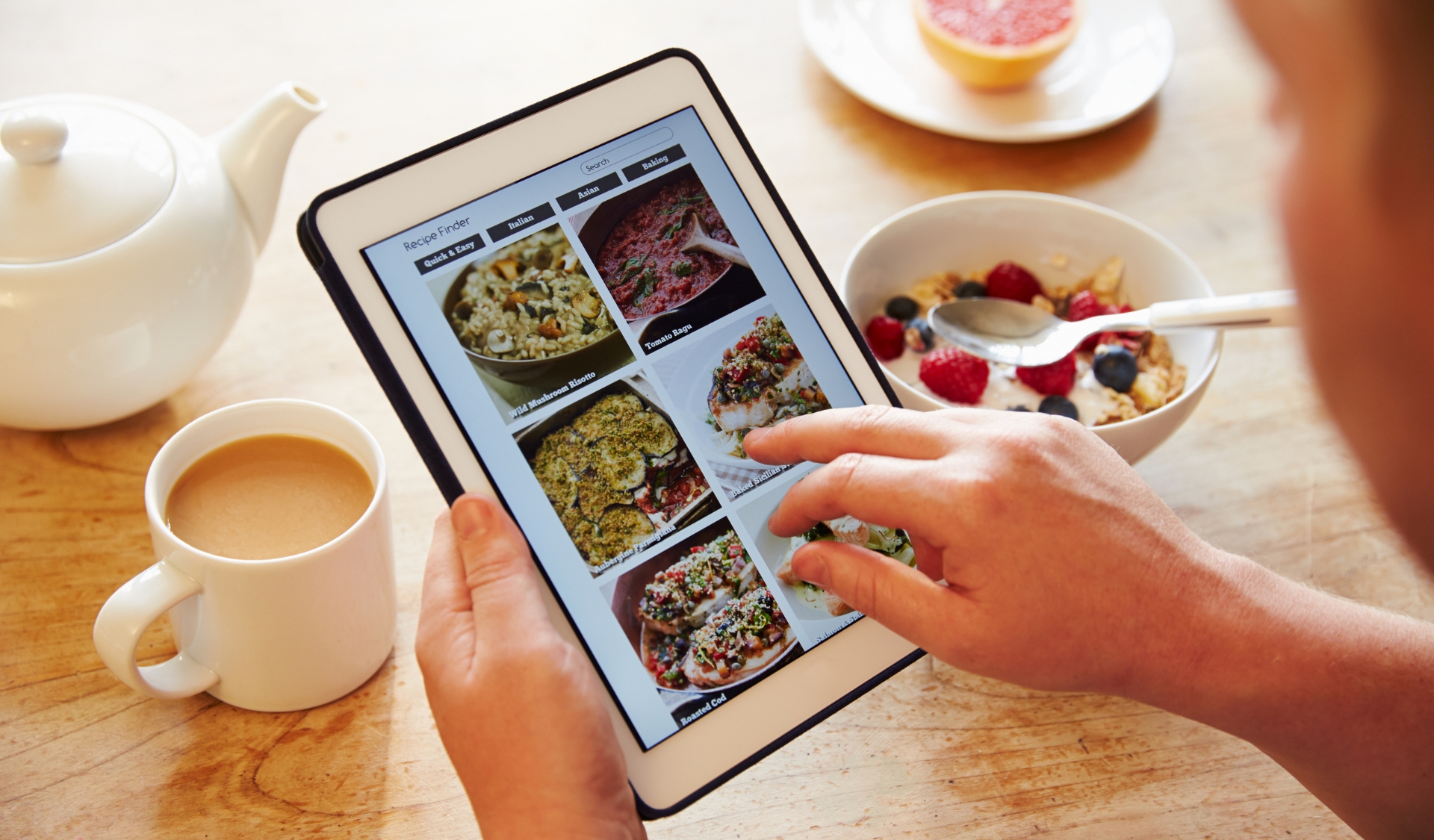 Person looking for gluten-free recipe on ipad