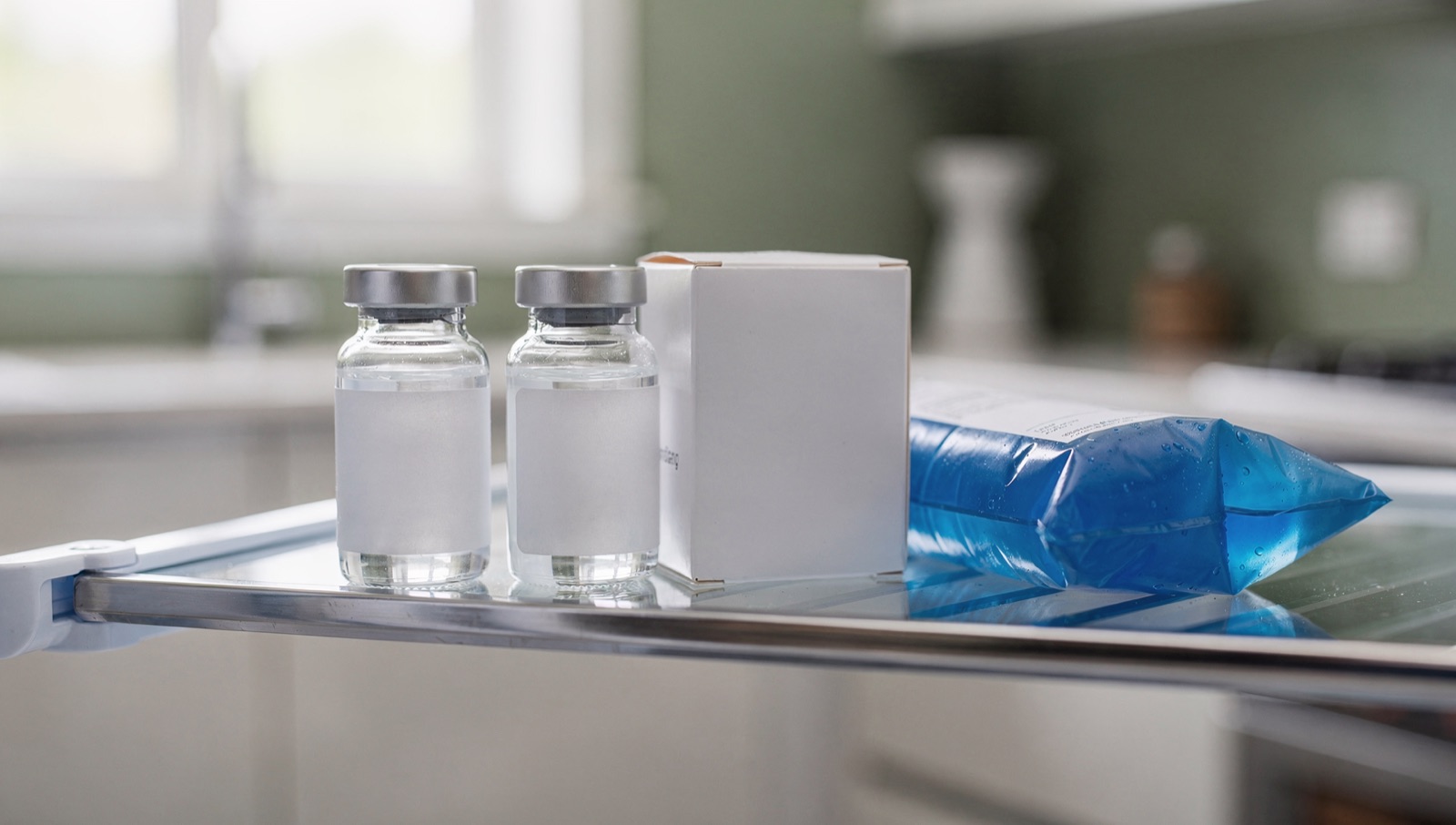 Peptide vials, pharmacy box, and cold pack on a refrigerator shelf