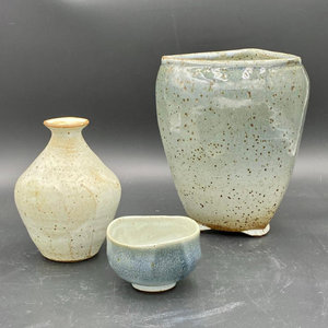 Somerville artist Les Floyd painting of a landscape with bright green trees and an old gray stone bridge over a scenic country river