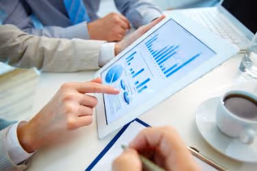 Person analyzing graphics