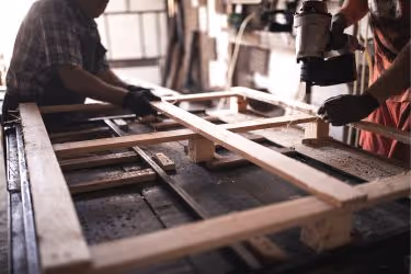 People assembling a pallet