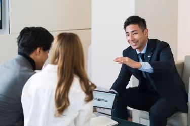 Sales Representative selling to a couple