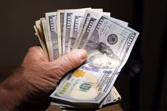 Cash Flow - Hands holding cash