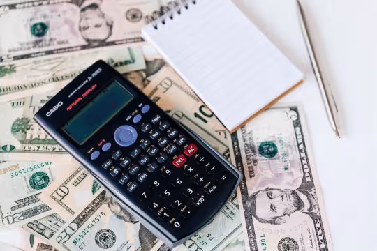Calculator and money for budgeting