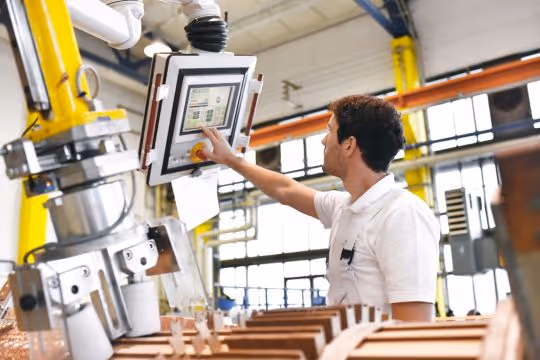 Lean Manufacturing for Pallet Mfgs - Man operating machinery