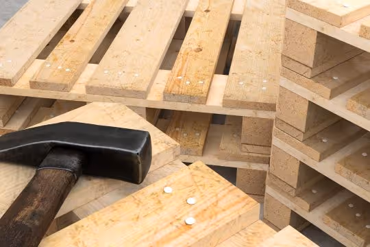 Wooden pallet and a hammer - Stop Selling Pallets, Start Solving Problems