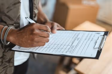Man doing a survey with a clipboard.