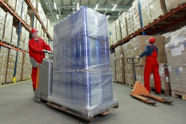 Why Preventive Maintenance Saves Pallet Mfgs - Workers dealing with pallets
