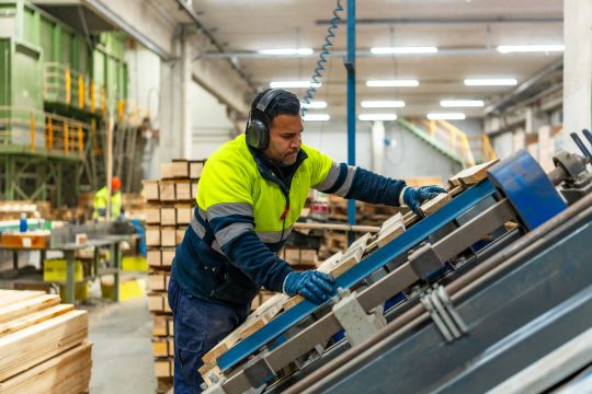 Handling Labor Shortages in Pallet Companies - Man working on Pallets