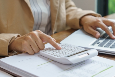 Business owner using the calculator