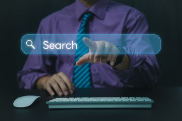 Man pointing a search bar