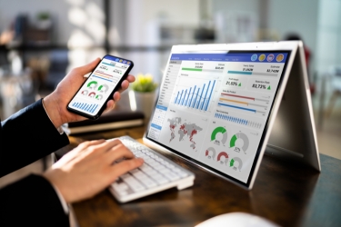 Man looking at a marketing dashboard