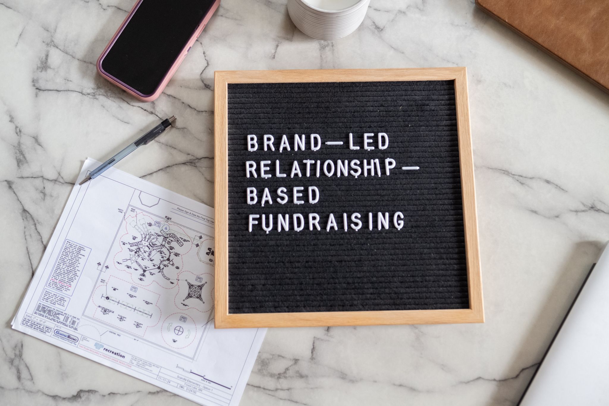 Photo with words saying brand led relationshops based fundraising a quote from brandraise