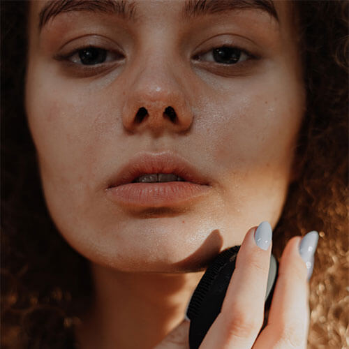 Close-up of the face of a curly girl.