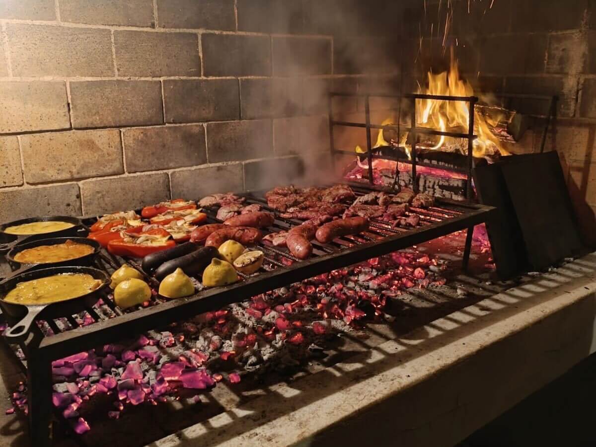 The asado - Uruguayan barbecue cooked over coals - La Barra Boundless Life