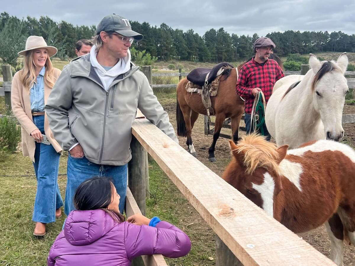 A family visits a horse ranch near La Barra Uruguay