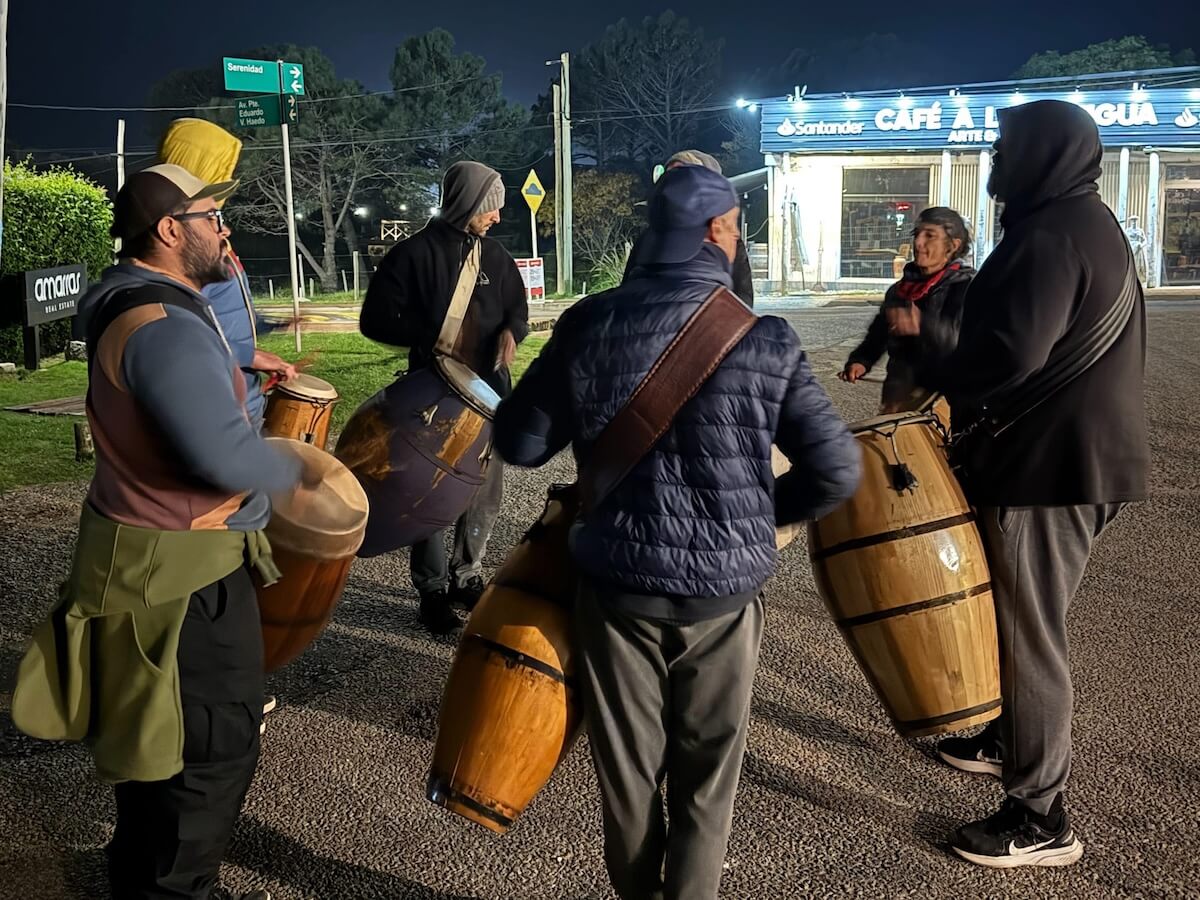 A group of Candombe drummers play in the streets in La Barra - travel family guide