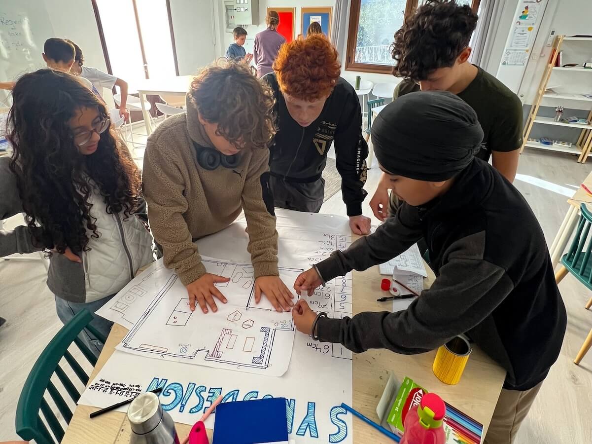 Boundless Life students get to work in a classroom while on cohort.