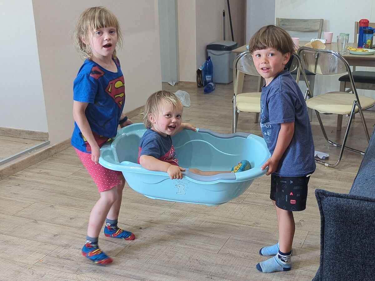 The Webster children playing in their apartment- Boundless Life