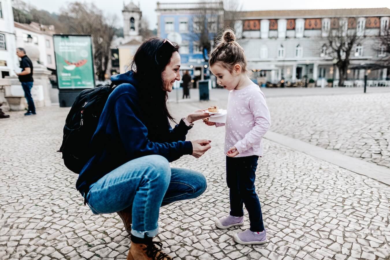 A mother and daughter try pastries in Sintra Portugal