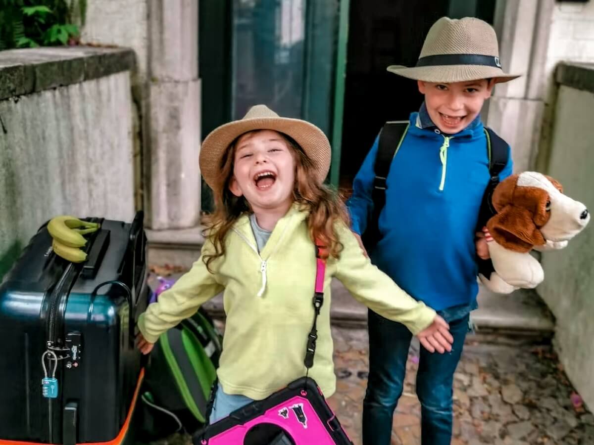 Two resilient young children / third culture kids prepare for travel, facing unique social emotional learning challenges