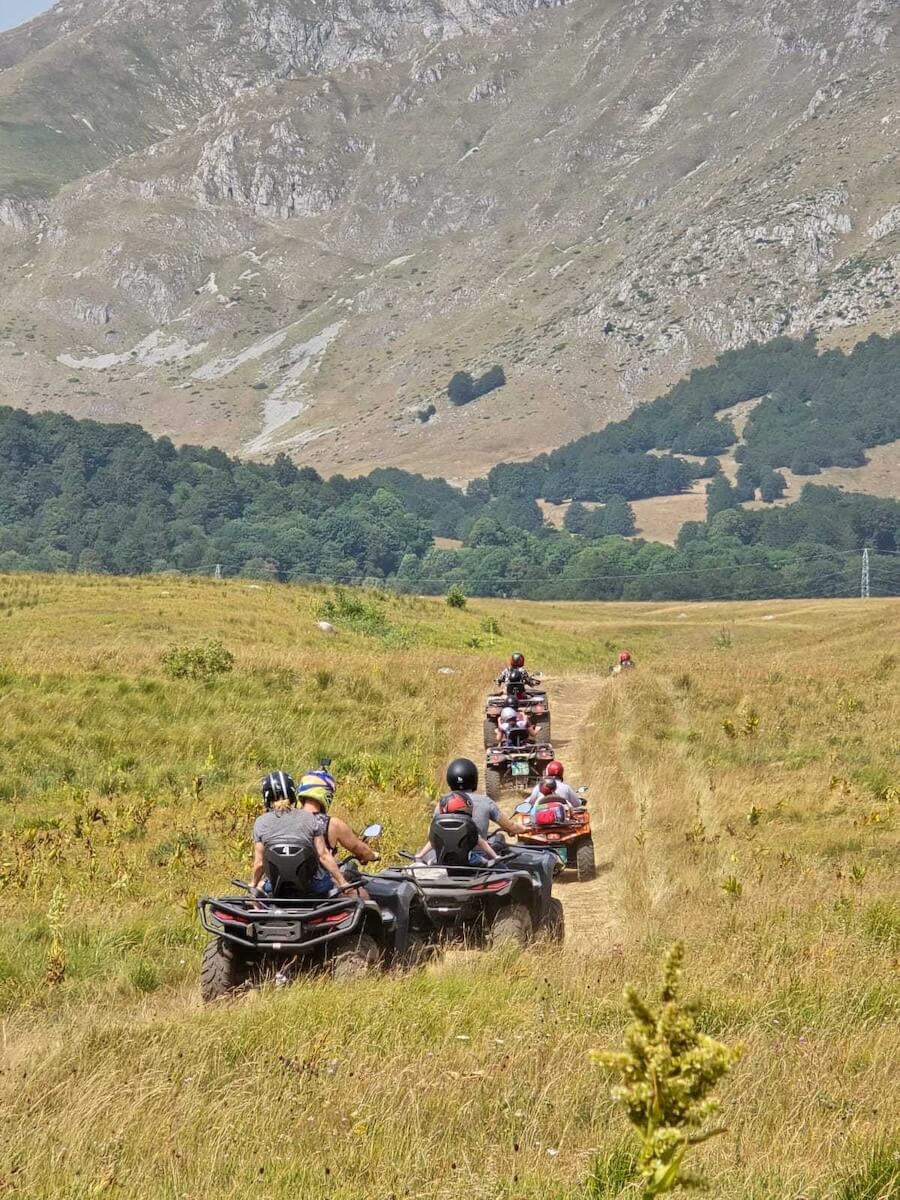 A quad bike tour in the mountains - gap year planning and budgeting