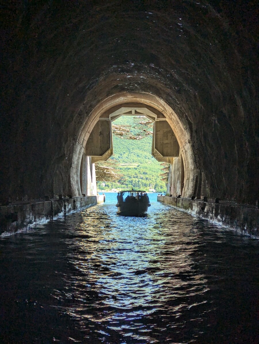 A boat trip in Kotor through a tunnel