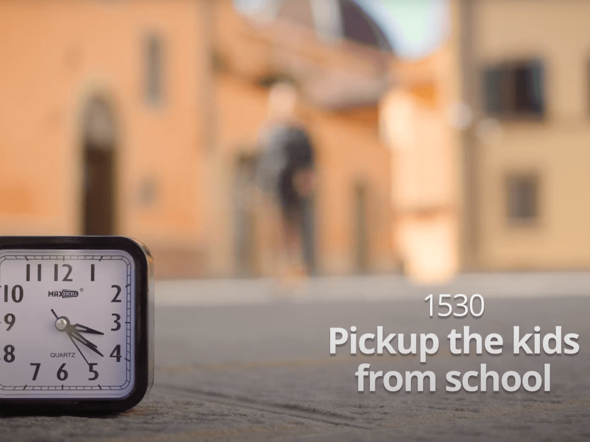 A clock in the street shows the time 3.30, time to pick up the kids from the Boundless Life Education Center in Tuscany Italy