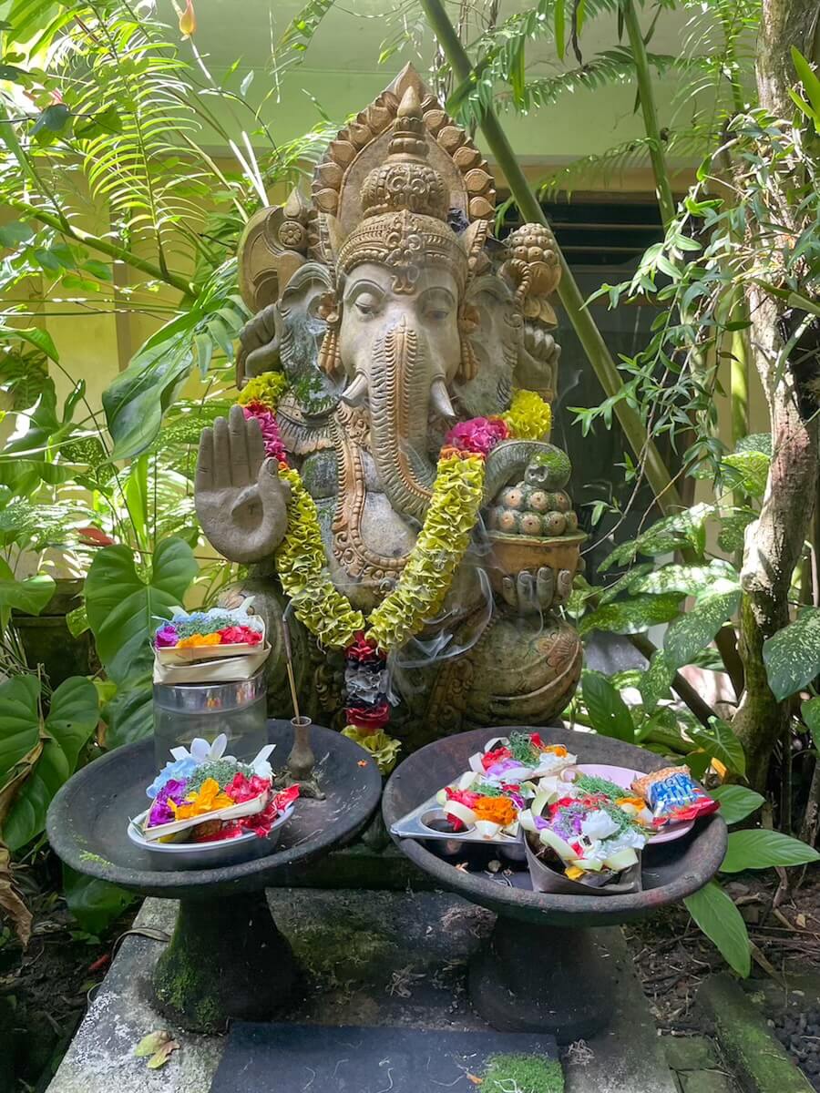 A statue offering in Ubud - a day trip from Sanur, Bali