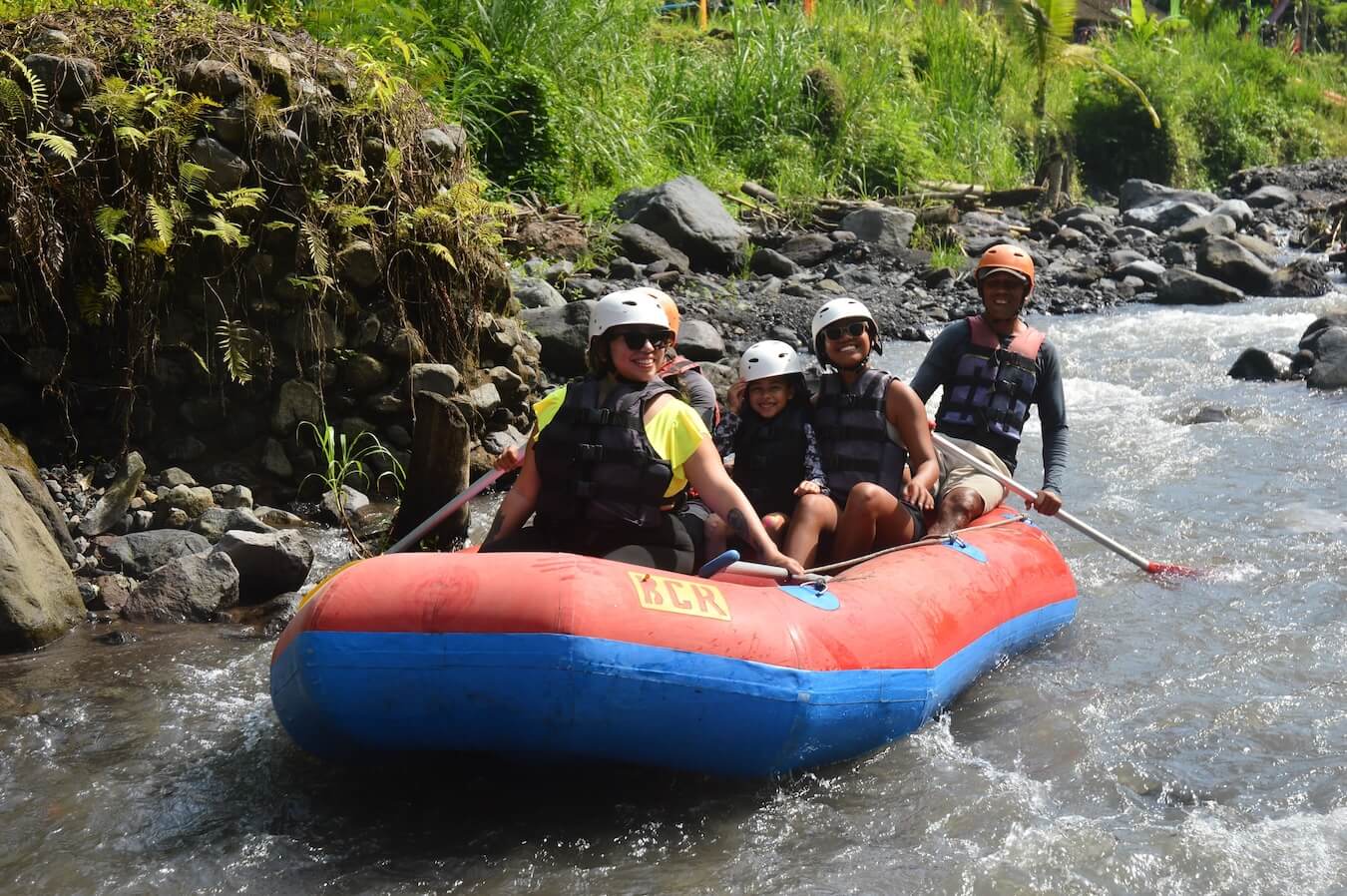 A group of parents from Boundless Life rafting on a day trip.