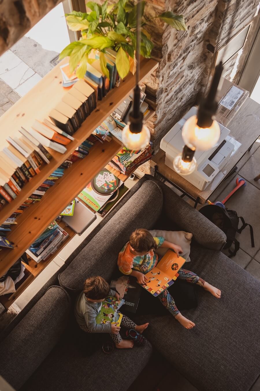 Two children read books from Boundless Life