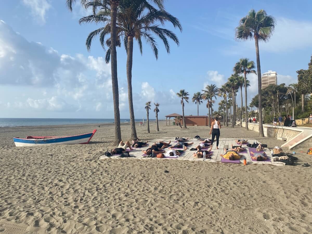 Boundless Life community practice yoga on the beach in Estepona, Andalusia